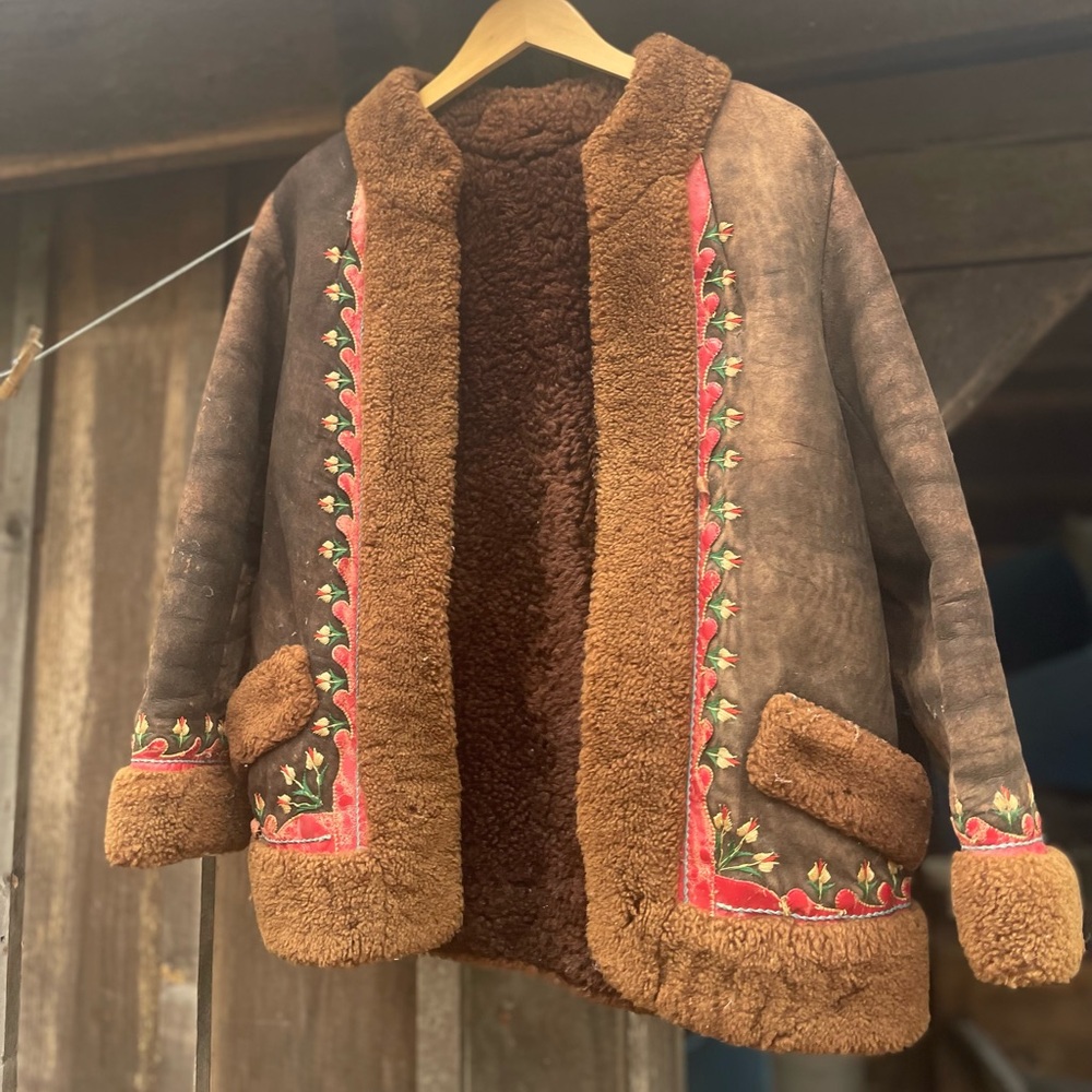 Embroidered Shearling Coat with Red Trim